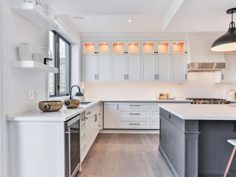Modern white kitchen remodel with custom cabinets