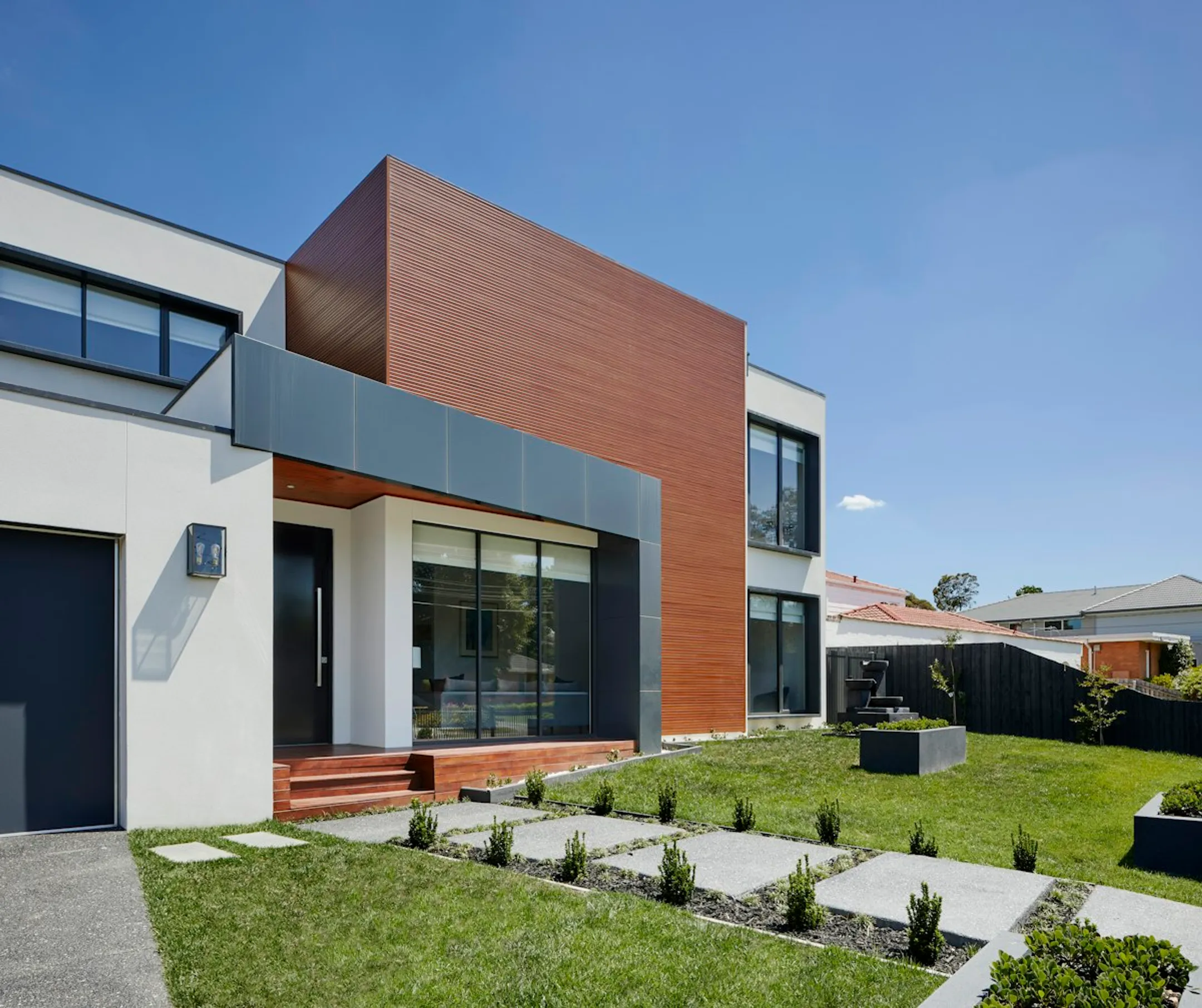 Home with modern architectural addition and new construction
